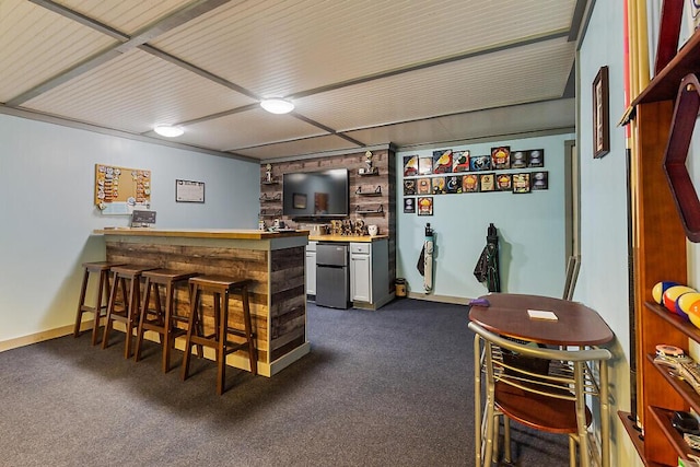 52 Casey Rd, Windsor, ME 04363 - indoor wet bar with dark carpet and refrigerator