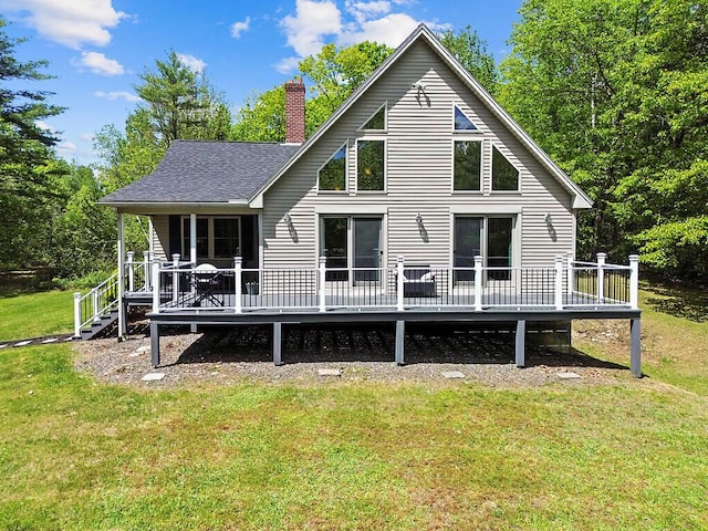 52 Casey Rd, Windsor, ME 04363 - back of house with a wooden deck, a lawn, a chimney, and a shingled roof