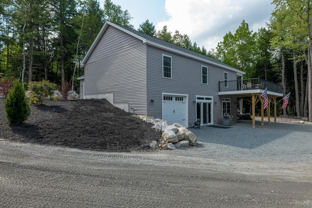 313 Nevells Way, Ellsworth, ME 04605 - view of front facade with an attached garage and a wooden deck