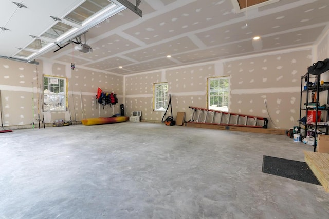 313 Nevells Way, Ellsworth, ME 04605 - garage featuring a garage door opener