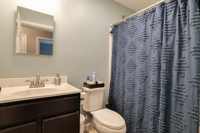 313 Nevells Way, Ellsworth, ME 04605 - full bathroom featuring toilet, vanity, and curtained shower