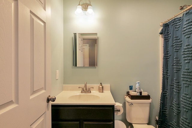 313 Nevells Way, Ellsworth, ME 04605 - bathroom with toilet, vanity, and curtained shower