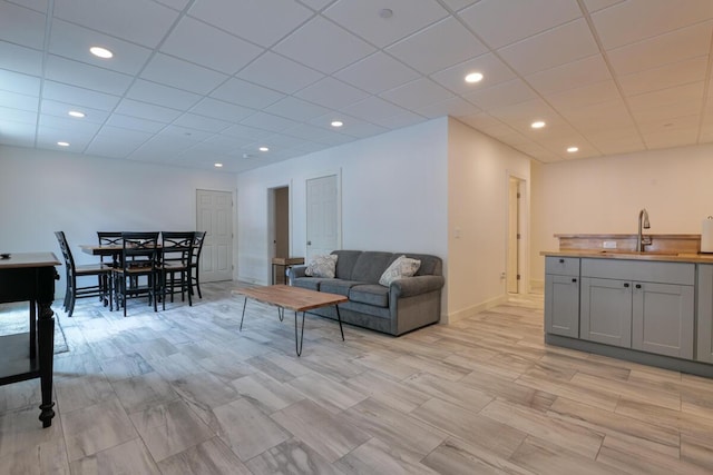 313 Nevells Way, Ellsworth, ME 04605 - living room featuring recessed lighting, a paneled ceiling, and baseboards