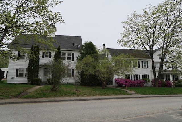 11 Green St, Winthrop, ME 04364 - colonial-style house featuring a front yard