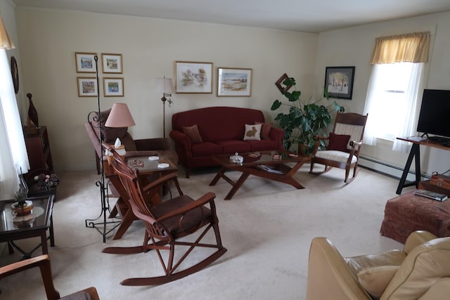 11 Green St, Winthrop, ME 04364 - living area with carpet and a baseboard heating unit