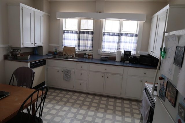 11 Green St, Winthrop, ME 04364 - kitchen with a sink, white dishwasher, electric range oven, white cabinets, and dark countertops