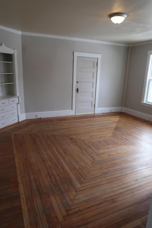 11 Green St, Winthrop, ME 04364 - unfurnished room featuring baseboards and ornamental molding
