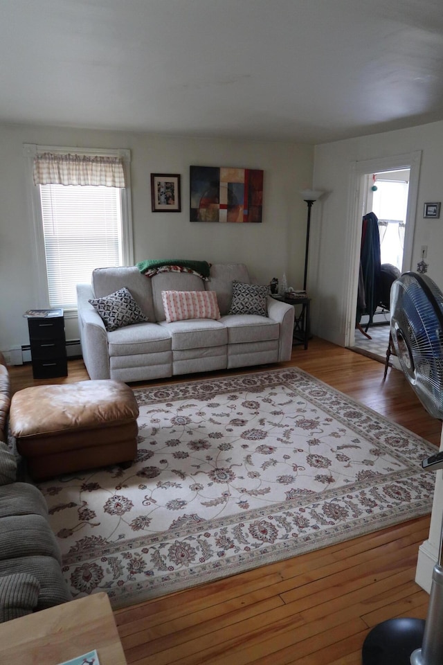 11 Green St, Winthrop, ME 04364 - living room featuring wood finished floors and baseboard heating