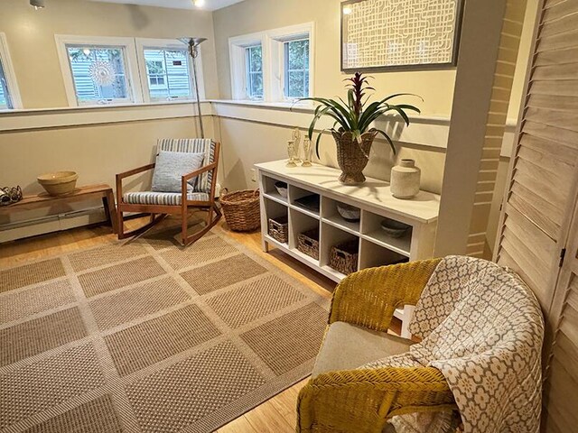 sitting room with wood finished floors