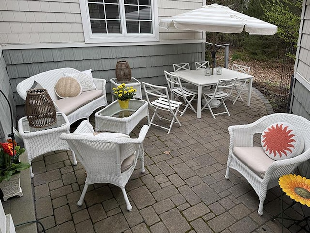 view of patio featuring outdoor dining space