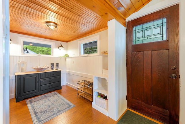 61 Beechwoods Rd, Oxford, ME 04270 - entryway featuring wooden ceiling, a wainscoted wall, and wood finished floors