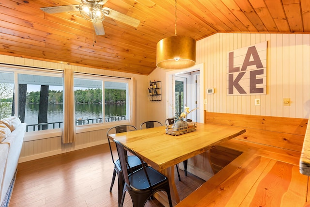 61 Beechwoods Rd, Oxford, ME 04270 - dining area featuring vaulted ceiling, wooden ceiling, wood walls, wood finished floors, and a ceiling fan