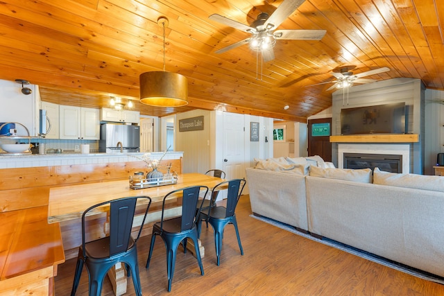 61 Beechwoods Rd, Oxford, ME 04270 - kitchen with appliances with stainless steel finishes, a ceiling fan, lofted ceiling, wooden ceiling, and tile countertops