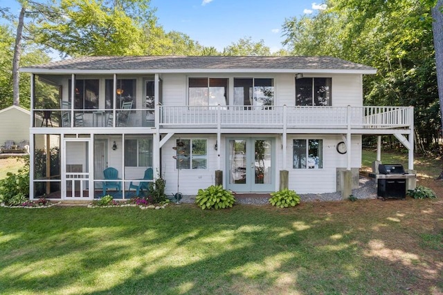 61 Beechwoods Rd, Oxford, ME 04270 - back of house with a sunroom, a yard, and roof with shingles