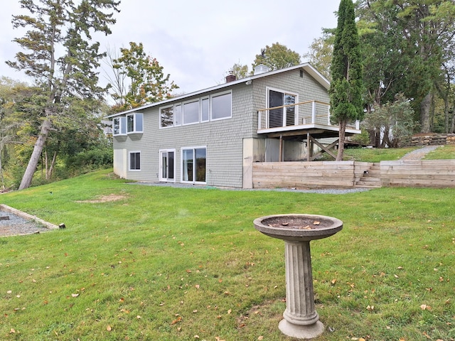 58 Back Shore Rd, Castine, ME 04421 - rear view of property featuring a chimney and a yard
