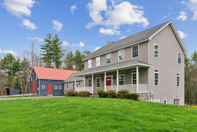 20 Motorcycle Dr, Windham, ME 04062 - view of front of property featuring covered porch, a front lawn, a chimney, and roof with shingles