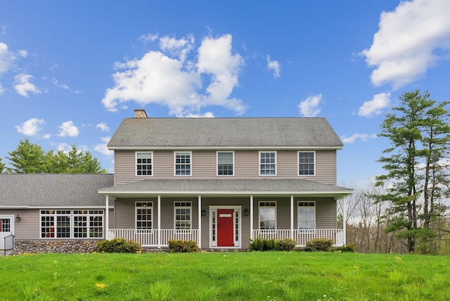 20 Motorcycle Dr, Windham, ME 04062 - colonial home featuring covered porch, a chimney, a front yard, and a shingled roof