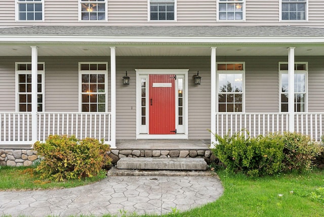 20 Motorcycle Dr, Windham, ME 04062 - doorway to property featuring a porch