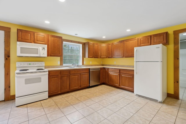 20 Motorcycle Dr, Windham, ME 04062 - kitchen with white appliances, light countertops, a sink, brown cabinets, and recessed lighting