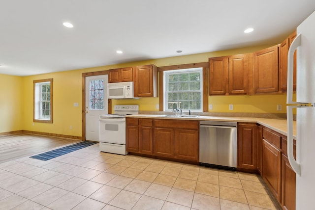 20 Motorcycle Dr, Windham, ME 04062 - kitchen featuring white appliances, a sink, light countertops, recessed lighting, and brown cabinets