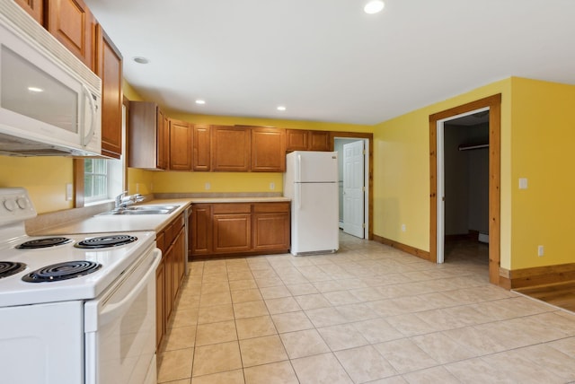 20 Motorcycle Dr, Windham, ME 04062 - kitchen featuring white appliances, a sink, light countertops, recessed lighting, and brown cabinetry