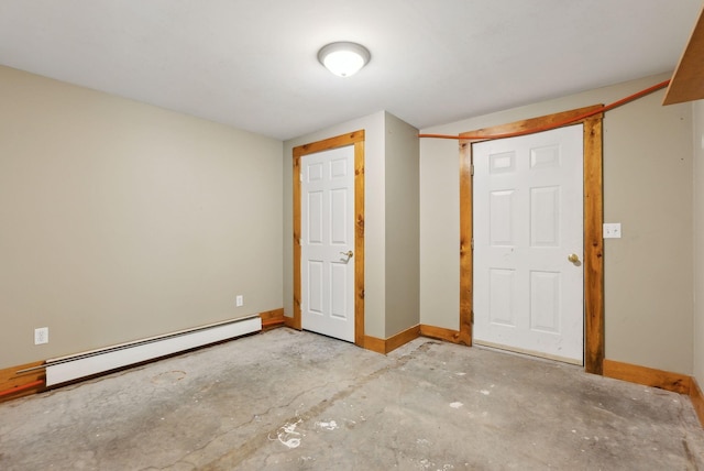 20 Motorcycle Dr, Windham, ME 04062 - unfurnished bedroom featuring baseboard heating, baseboards, and unfinished concrete flooring