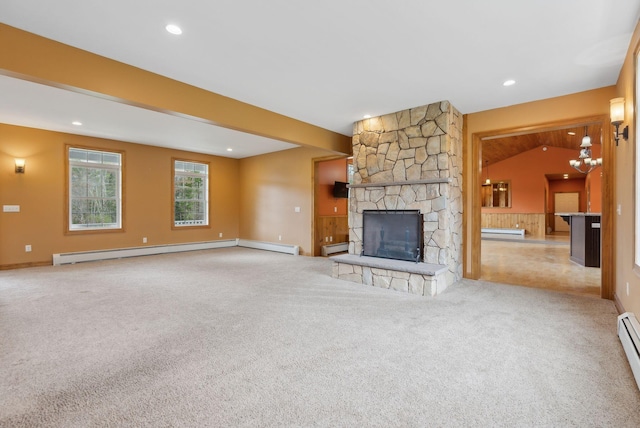 20 Motorcycle Dr, Windham, ME 04062 - unfurnished living room featuring carpet, a stone fireplace, a baseboard heating unit, recessed lighting, and baseboards