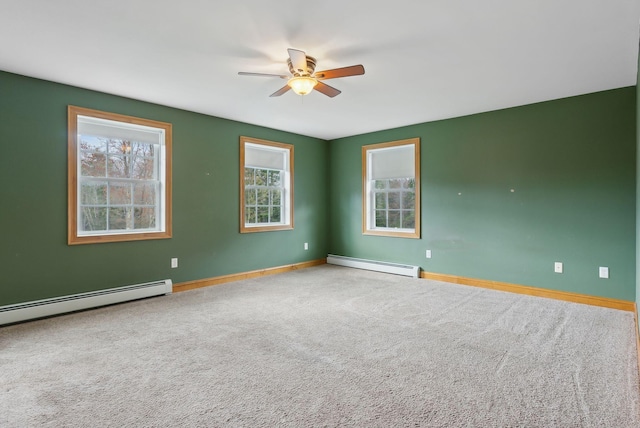 20 Motorcycle Dr, Windham, ME 04062 - carpeted empty room featuring baseboard heating, a ceiling fan, and baseboards