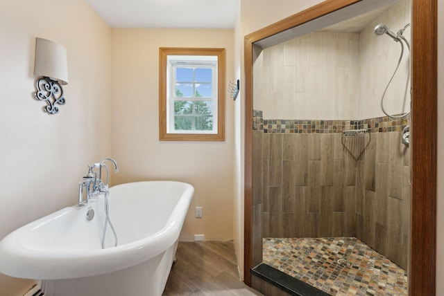 20 Motorcycle Dr, Windham, ME 04062 - full bath featuring a tile shower, wood finished floors, a freestanding tub, and baseboards