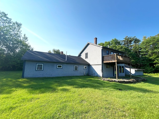 320 Spring Rd, Augusta, ME 04330 - back of house featuring a lawn, a deck, and a chimney