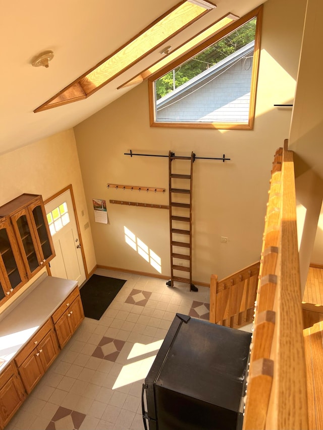 320 Spring Rd, Augusta, ME 04330 - staircase featuring a skylight and tile patterned floors