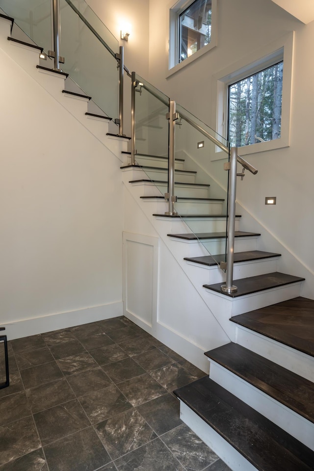 106 Webb River Dr, Dixfield, ME 04224 - staircase with baseboards and stone finish flooring