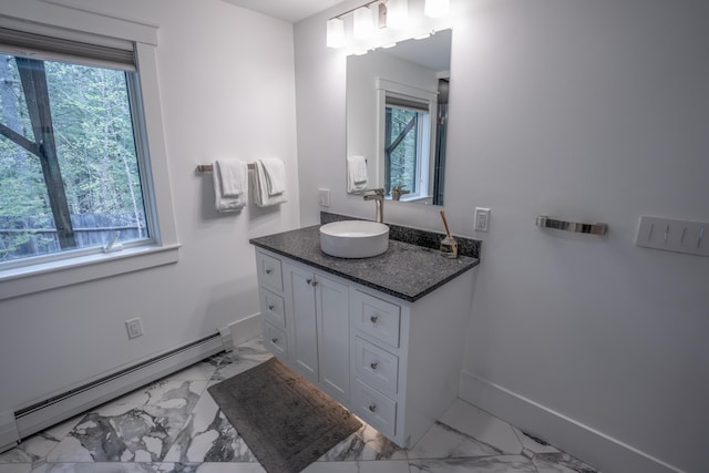 106 Webb River Dr, Dixfield, ME 04224 - bathroom with a baseboard heating unit, marble finish floors, and healthy amount of natural light