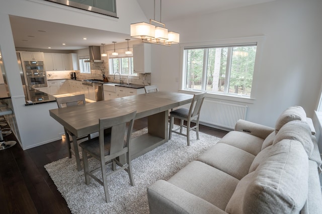 106 Webb River Dr, Dixfield, ME 04224 - dining room with dark wood-type flooring, recessed lighting, and a chandelier