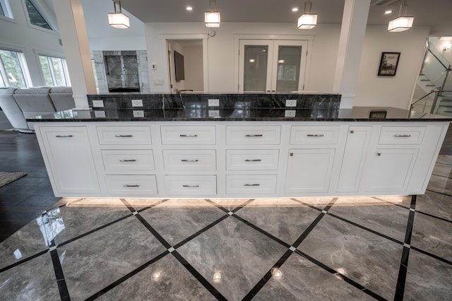 106 Webb River Dr, Dixfield, ME 04224 - full bathroom featuring marble tiled floors, recessed lighting, double vanity, a tile shower, and inlaid floor details