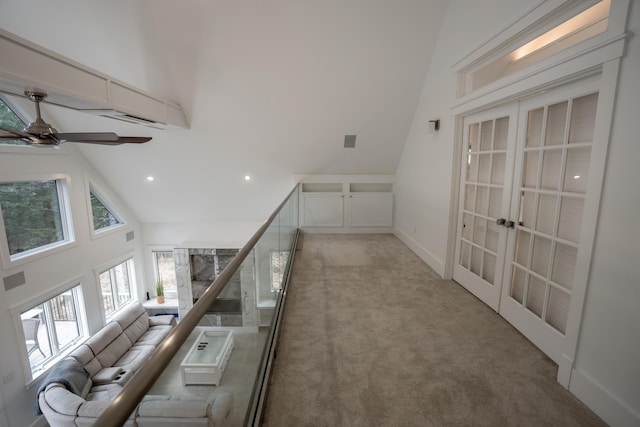 106 Webb River Dr, Dixfield, ME 04224 - corridor featuring healthy amount of natural light, carpet, french doors, high vaulted ceiling, and recessed lighting