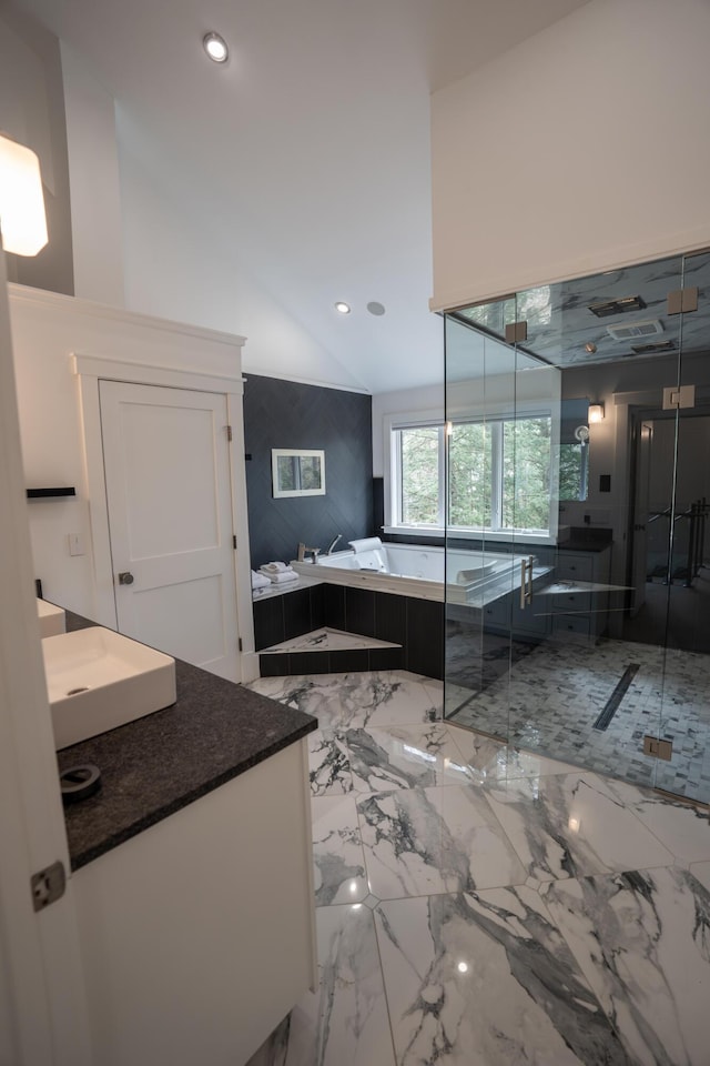 106 Webb River Dr, Dixfield, ME 04224 - bathroom featuring a stall shower, recessed lighting, a garden tub, marble tiled floors, and vanity