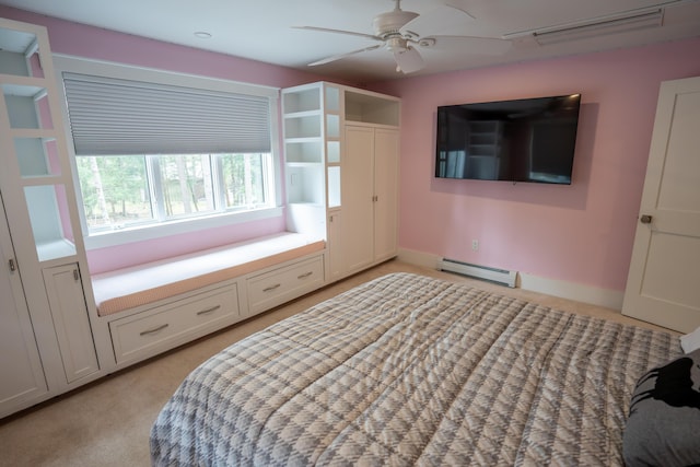 106 Webb River Dr, Dixfield, ME 04224 - unfurnished bedroom with a baseboard heating unit, light colored carpet, and a ceiling fan