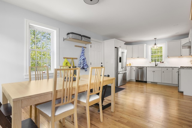 dining room featuring light wood-type flooring