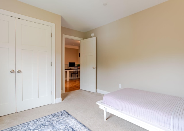 22 Lilac Ln, Gorham, ME 04038 - bedroom featuring light colored carpet, baseboards, and a closet