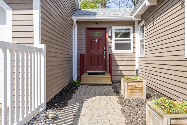 591 Eight Rod Rd, Augusta, ME 04330 - doorway to property with roof with shingles