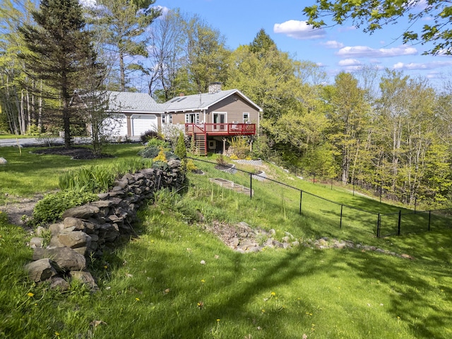 591 Eight Rod Rd, Augusta, ME 04330 - view of yard featuring a deck, a garage, and stairway