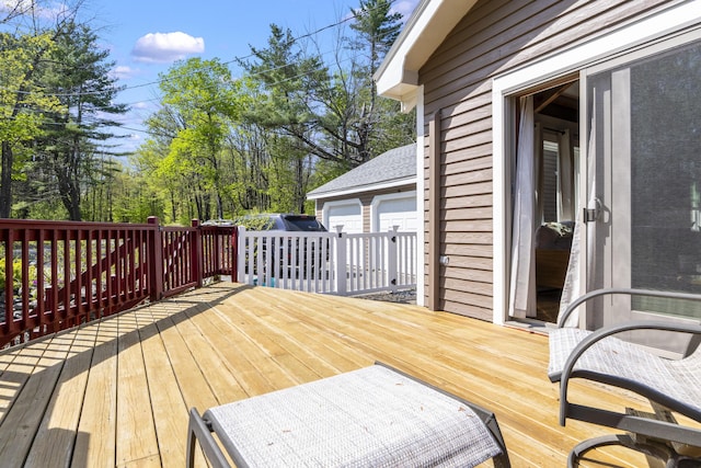 591 Eight Rod Rd, Augusta, ME 04330 - wooden terrace featuring a detached garage