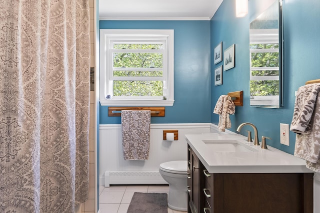 591 Eight Rod Rd, Augusta, ME 04330 - bathroom with a baseboard heating unit, toilet, healthy amount of natural light, vanity, and wainscoting
