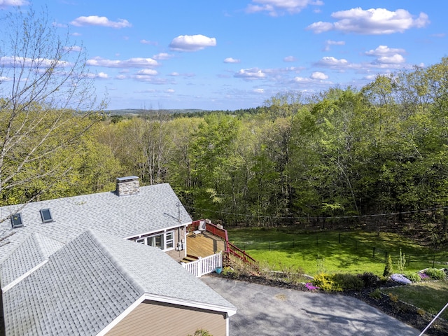 591 Eight Rod Rd, Augusta, ME 04330 - view of subject property with a heavily wooded area