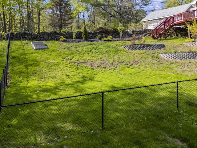591 Eight Rod Rd, Augusta, ME 04330 - fenced backyard featuring stairway and a deck