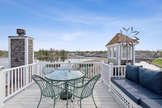 15 Christensen Ln Unit A1, Kennebunk, ME 04043 - wooden terrace featuring an outdoor living space and a water view