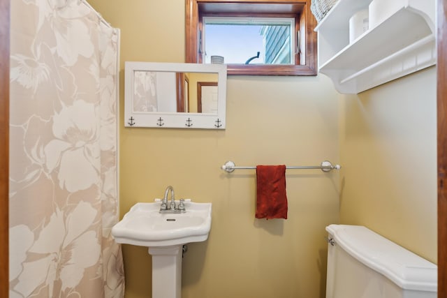 15 Christensen Ln Unit A1, Kennebunk, ME 04043 - bathroom with a shower with curtain and toilet