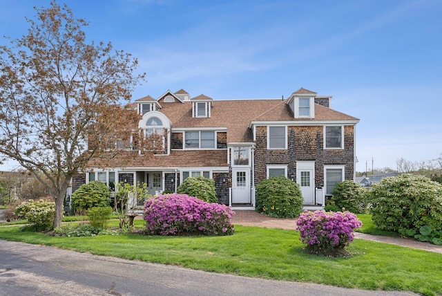 15 Christensen Ln Unit A1, Kennebunk, ME 04043 - shingle-style home with a front yard and stone siding