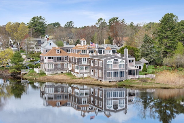 15 Christensen Ln Unit A1, Kennebunk, ME 04043 - rear view of property with a water view and view of scattered trees